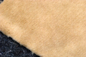 Fibers, animal hairs, have been used extensively in human clothing and bedding. Sheep, llama, and alpaca have been bred for hairs with particular qualities.