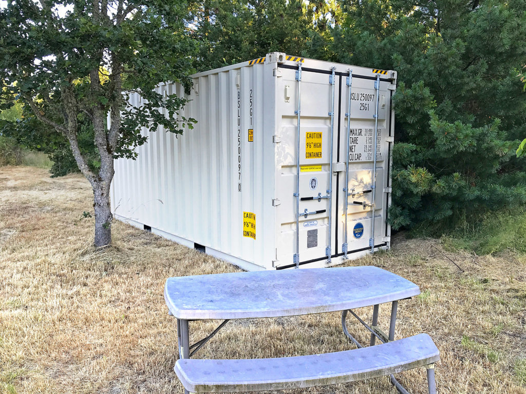 The cargo container is weather-proof and largely sound-proof.  Mark installed electrical, heating, and cooling and there is a hose bib for water outside.